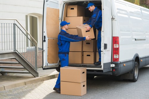 House removalists loading furniture for a Waterloo home move