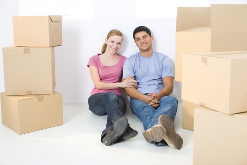 Professional office relocation team setting up furniture in a new Waterloo workplace